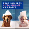 A picture of a dog and a baby in a bathtub, with a text banner saying Dog's skin is as ultra delicate as a baby's.